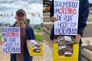 Jovem vende ração de cachorro no semáforo para ajudar a alimentar animais de rua