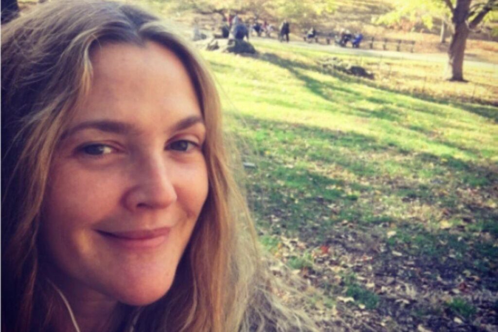 Drew Barrymore ainda na infância no filme E.T