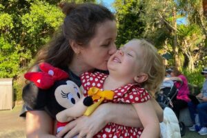 Alice na Disney com a família