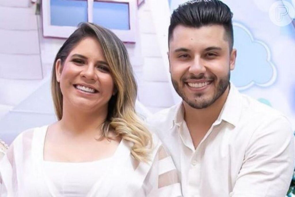 Murilo e Leo de mãos dadas
