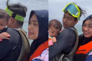 Quem estava segurando o bebê era quem dirigia o Jet Ski